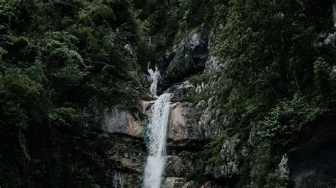 Download Wallpaper 2560x1440 Waterfall River Cliff