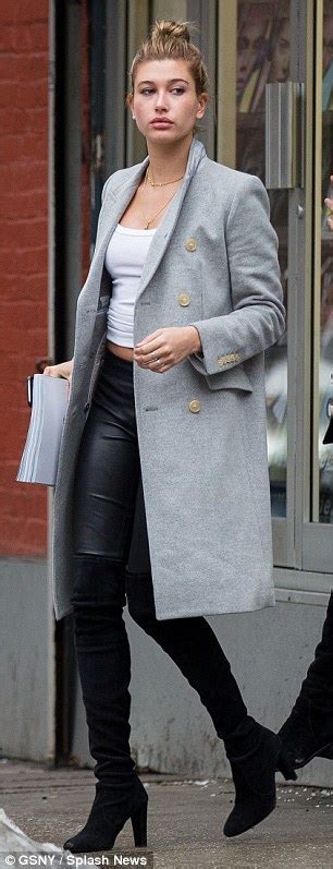 Hailey Baldwin Keeps It Casual In An Oversized Grey Coat As She Enjoys A Spot Of Retail Therapy