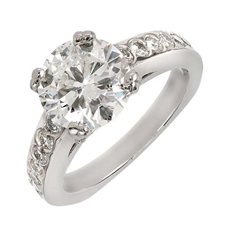 5 out of 5 stars. Peter Suchy Triangle Diamond Solitaire Platinum Engagement Ring For Sale at 1stdibs