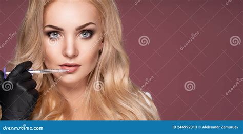 Closeup Female Doctor Holds A Syringe In Her Hand Pink Background Isolate Stock Image Image