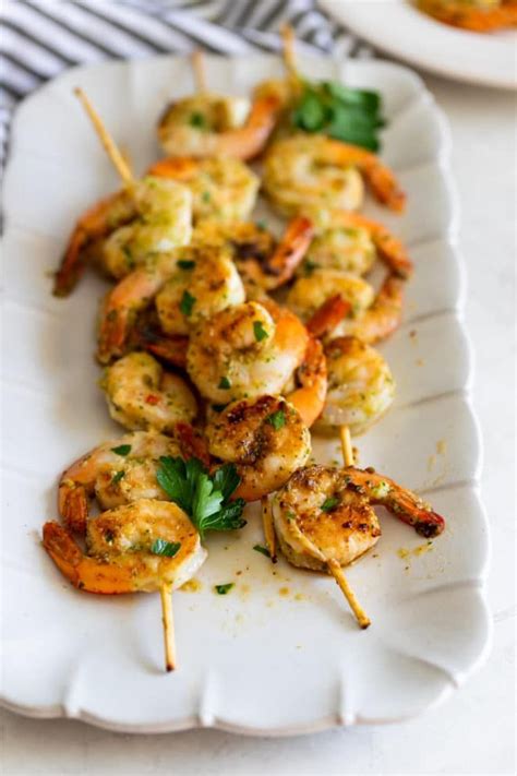 These shrimp are marinated in a garlic, cilantro, lime marinade. Grilled Shrimp Skewers | Recipe | Shrimp skewers, Grilled ...