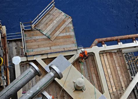 Overhead View Of An Offshore Rigger Preparing A Platform To Accomodate