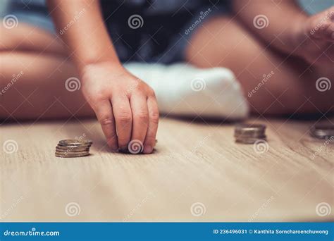 Little Child Girl Hand Were Counting Silver Coins That Were Lying On