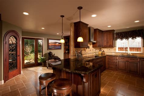 All you have to do is go to a specialty tile store to get a feel for the hundreds, if not thousands. Tuscany Inspired Kitchen with California Flavor. Cabinets ...