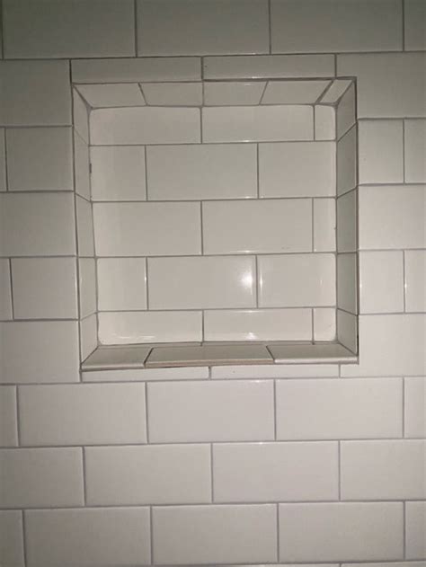 Why are most bathrooms tiled? Bathroom Shower niche tile disaster? What is wrong with ...