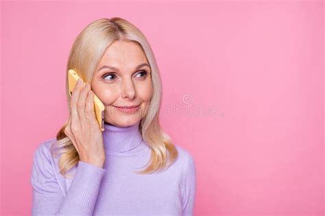Close Up Photo Portrait Blonde Senior Lady Talking On Mobile Phone