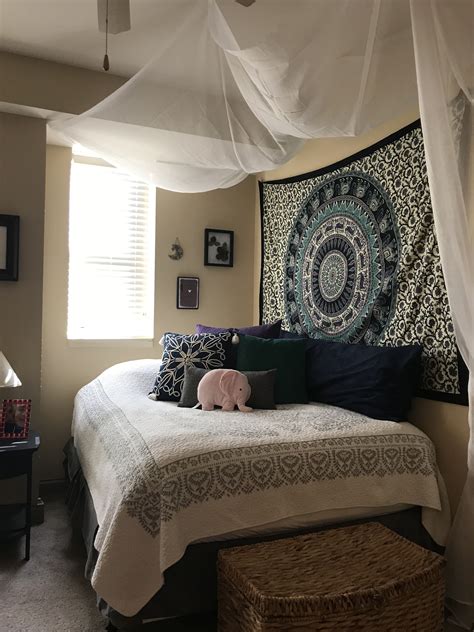 Wooden poster bed in bedroom interior setting. Cute canopy and bed set up in college apartment | Bed ...