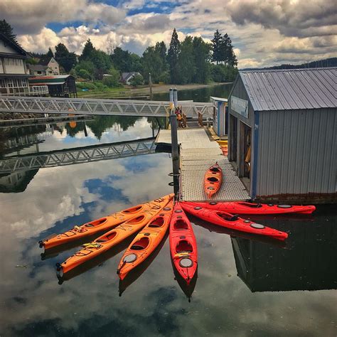 Orange Kayaks Photograph By Jerry Abbott Pixels