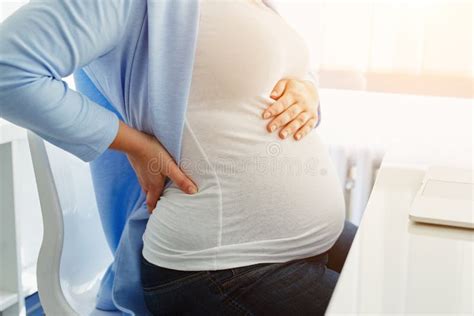 Pregnant Woman With Back Pain Stock Photo Image Of Woman Touching