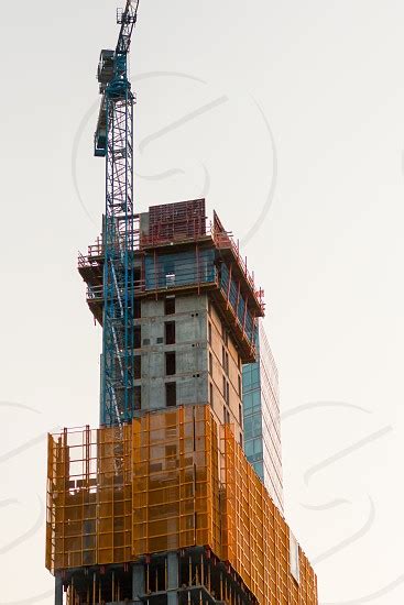 Tall Skyscraper Under Construction By Alex Landry Photo Stock Studionow