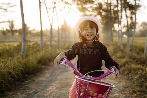 Independent Asian Child Ride Her Bicycle Stock Photo Image Of Outdoor
