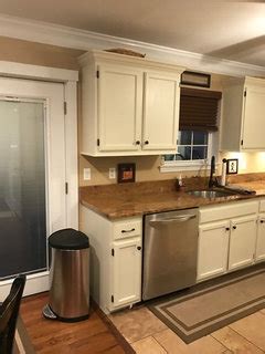 Umber is a relative of brown which is known as a neutral. Paint color for kitchen with taupe cabinets