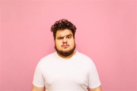 Premium Photo Funny Fat Man In A White Tshirt On Pink Background