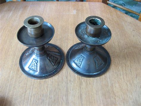 Antiques Atlas Pair Of Arts And Crafts Candlesticks