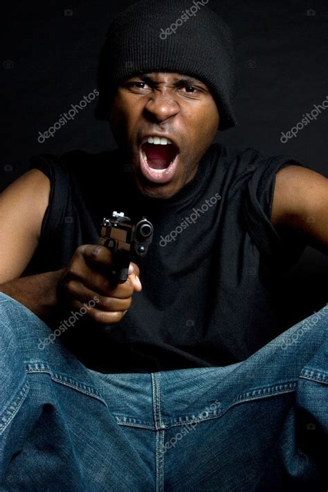 Gangster Holding Gun Stock Photo By ©keeweeboy 4040066