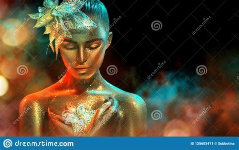 Fashion Model Woman In Colorful Bright Golden Sparkles And Neon Lights
