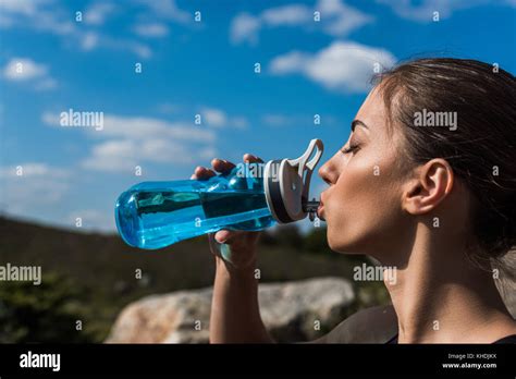 Sporty Woman Drinking Water Stock Photo Alamy