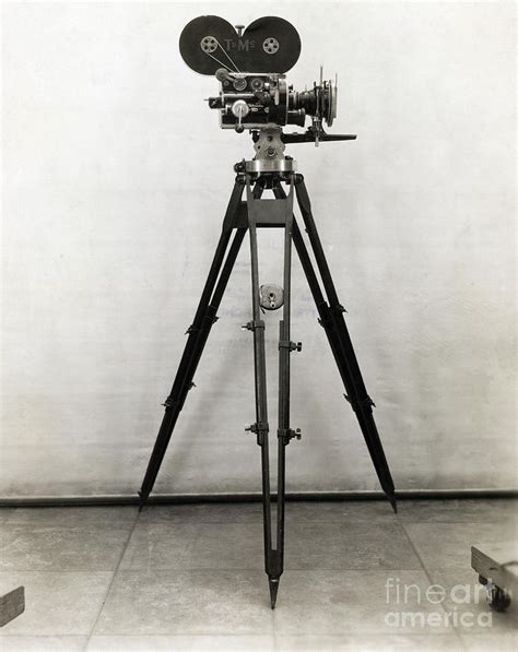 Early Movie Camera On Tripod By Bettmann