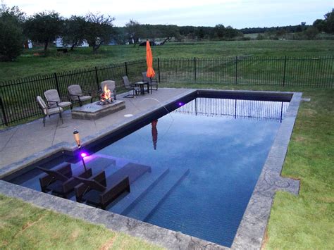 Simple Rectangular Pool With Pool Furniture And Fireplace Inground Pool Designs Rectangular