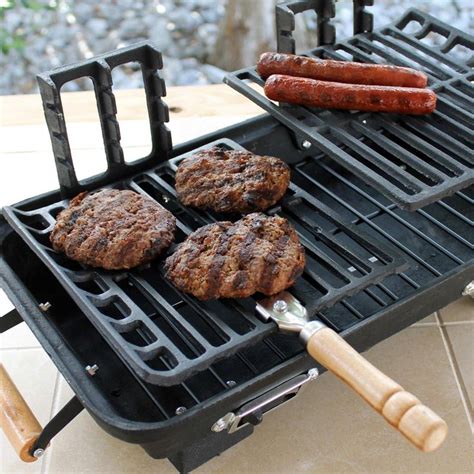 Hamburgers And Hot Dogs Cooking On An Outdoor Grill