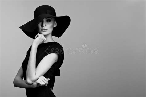High Fashion Portrait Of Elegant Woman In Black And White Hat An Stock