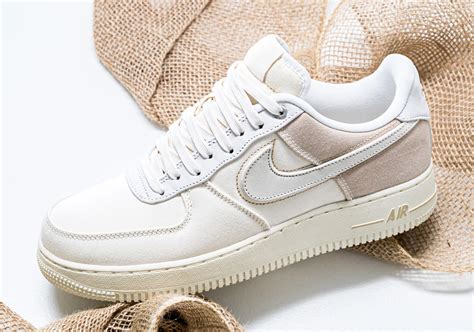 Constructed with canvas across the uppers while tumbled leather lands on the nike swoosh. nike air force sand colour