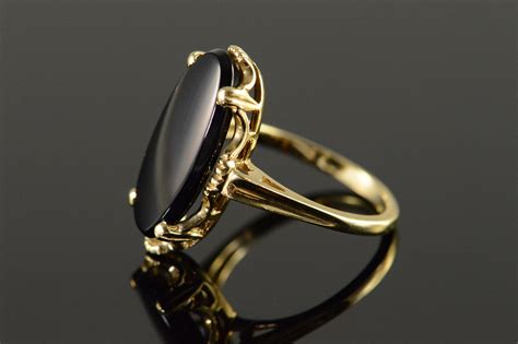 14k 34g 18x9mm Oval Black Onyx Yellow Gold Ring Size 6 Property Room