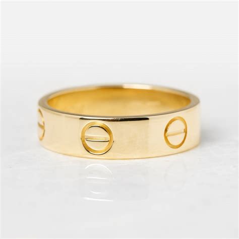 From effortless trinity bands and juste un clou rings to designer aldo cipullo's love design, cartier continues to craft classics with staying power. Cartier 18k Yellow Gold Love Ring Size P COM1095 | Second ...
