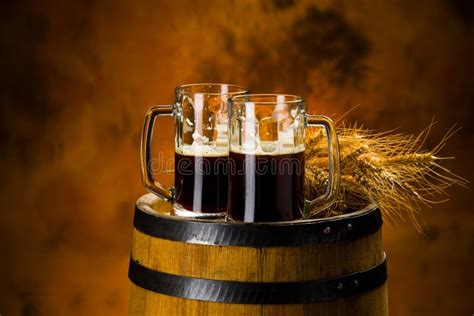 Dark Beer With Foam In Glasses On A Table Stock Image Image Of