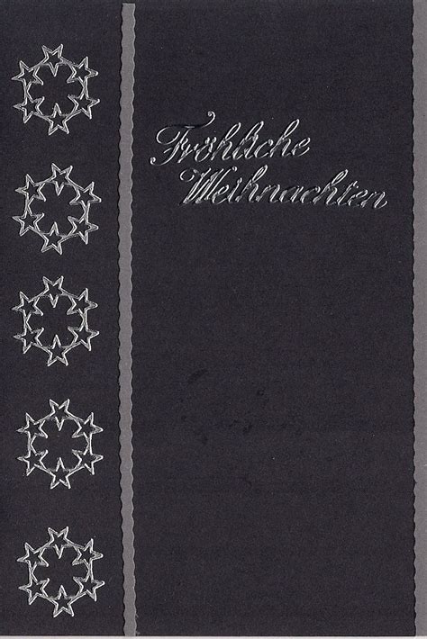 Selbstgebastelte Weihnachtskarte aus Tonkarton und Aufklebern