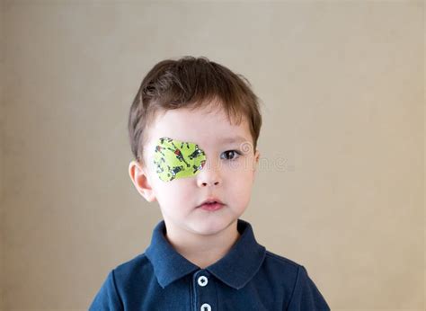 Little Boy With Okluder On The Eye Stock Photo Image Of Injury