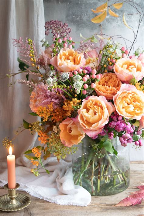 Purple wax flowers, peach david austin roses juliet and yellow coxcomb, filled with red clover, blue sea holly, rosemary, yellow craspedia and light pink astilbes. Edith rose by David Austin Wedding & Event Roses. If you ...