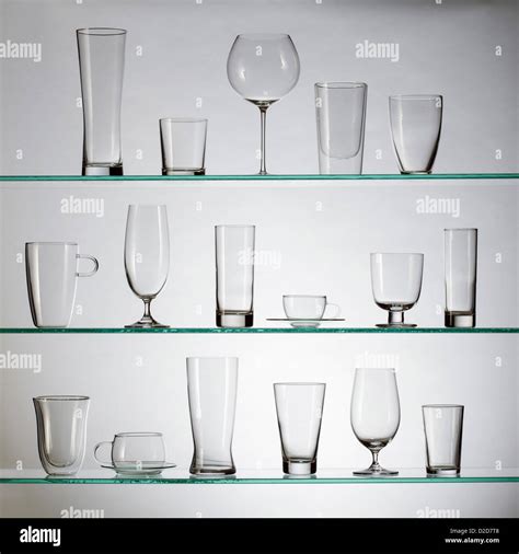 A Collection Of Various Types Of Drinking Glasses Arranged Neatly On