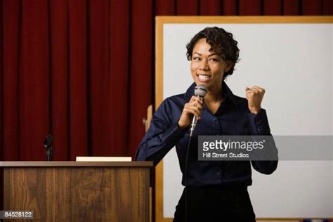 Black Woman Speaker On Stage Photos And Premium High Res Pictures