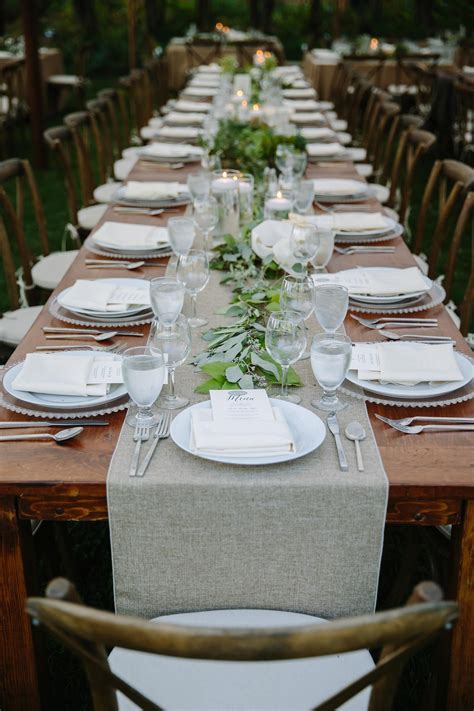 elegant table settings at a wood table at Brookwood Garden… | Wedding