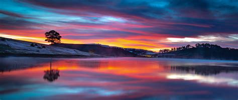 Download Lake Reflections Sunset Clouds Nature 2560x1080 Wallpaper