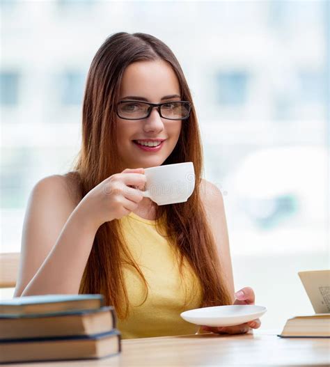 Young Student Drinking Coffee Sudying Stock Photos Free And Royalty