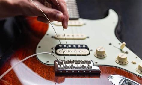 How To Restring An Electric Guitar String Change Guide Music Grotto