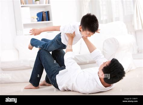 Tender Moment Between Father And Son Stock Photo Alamy