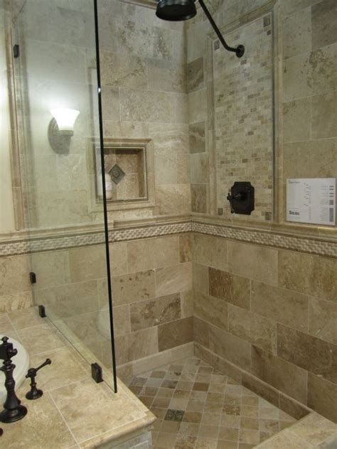 Ready for some fancy ideas? Honed Driftwood Travertine bathroom with oil rubbed bronze ...