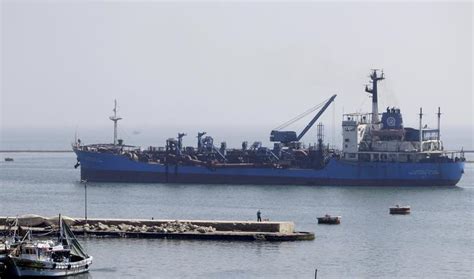 As it finally began to move, ships that had gotten queued up during the wait blared their horns in celebration. Suez Canal Authority says attack attempted on container ...