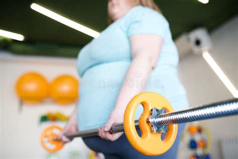 Overweight Woman Exercising In Gym Stock Image Image Of Obese