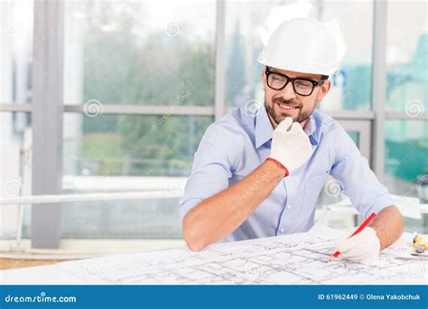 Attractive Male Architect Is Working On The Stock Image Image Of
