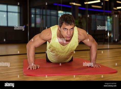 Young Muscle Man Doing Push Ups In Gym Bodybuilder Male Working Out In
