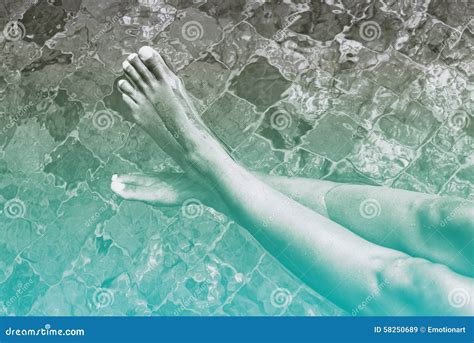 Bare Woman Legs Relaxing On Clear Water Stock Image Image Of Caucasian Nail