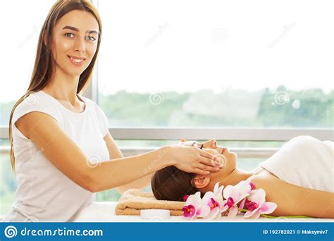 Young Beautiful Girl Having Face Massage Relaxing In Spa Salon Stock Image Image Of Pleasure