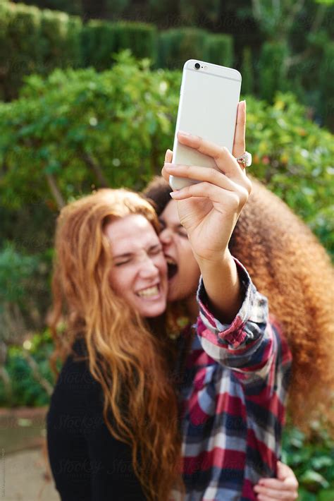 Emotional Girls Taking Selfie In Garden Stock Image Everypixel