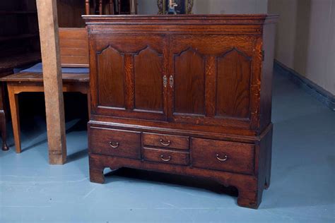 A bit of wear and tear, but in good working condition. Welsh Oak Carmarthen Cupboard For Sale at 1stDibs