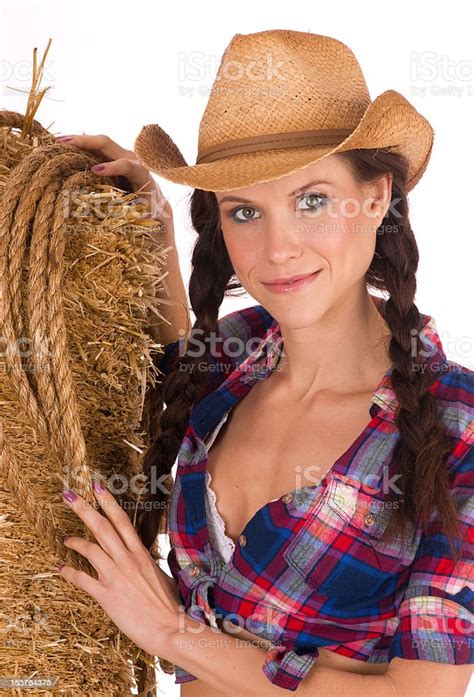 Western Woman Cowboy Hat Grabs Rope Hay Bale Attractive Cowgirl Stock