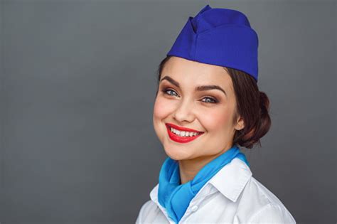 Professional Occupation Stewardess Standing Isolated On Grey Looking